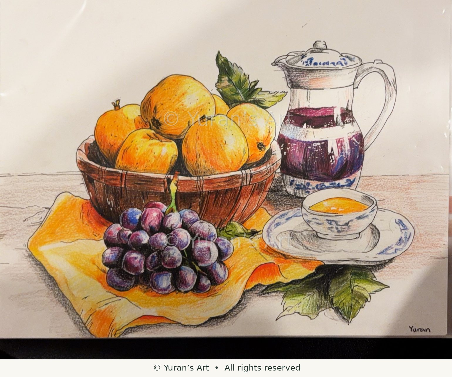 Fruit, a pitcher, and a teacup arranged on a table.