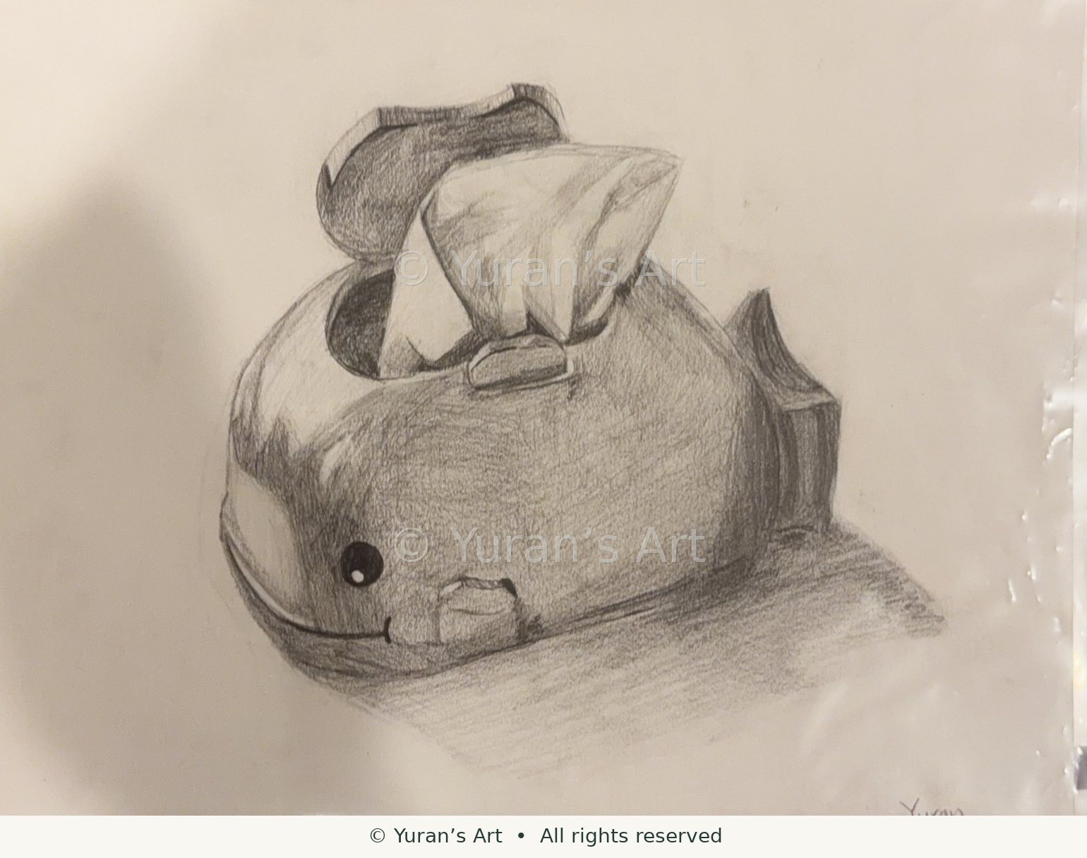 A shaded study of a whale-shaped tissue box.